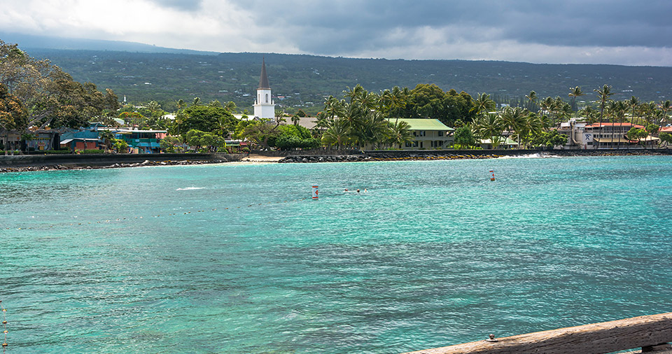 Kailua, Kona town shot from the ocean on a boat.