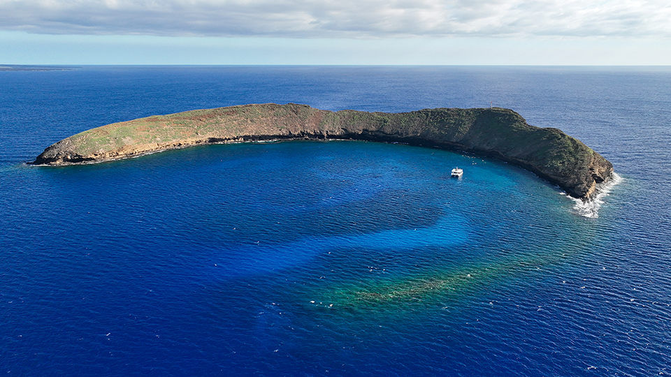 Aerial View of Molokini with the Pride of Maui