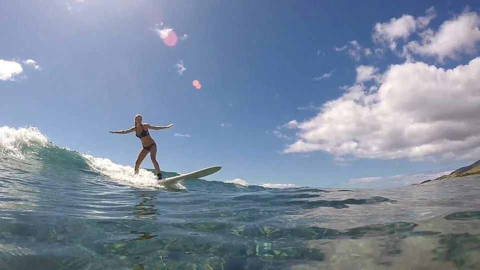 Woman Surfing on Maui