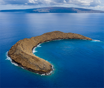Molokini Crater with Maui in the Background