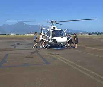 Guests boarding helicopter in Maui