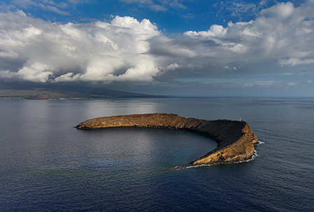 Calm morning conditions inside Molokini Crater with clear water and light winds
