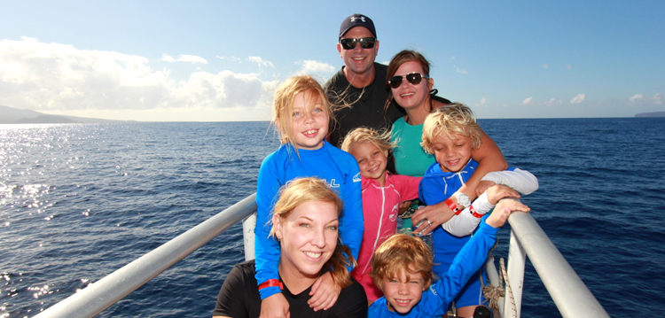 A big family on the bow of the Pride of Maui boat.