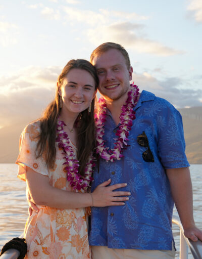 Couple on Deck Smiling on Pride of Maui Sunset Dinner Cruise and Luau